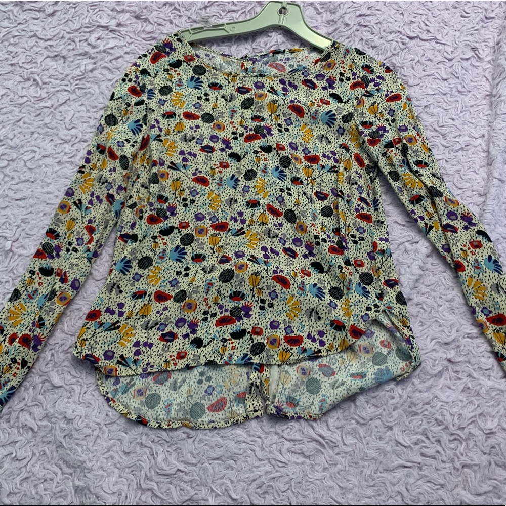 Patterned shirt with button up back
